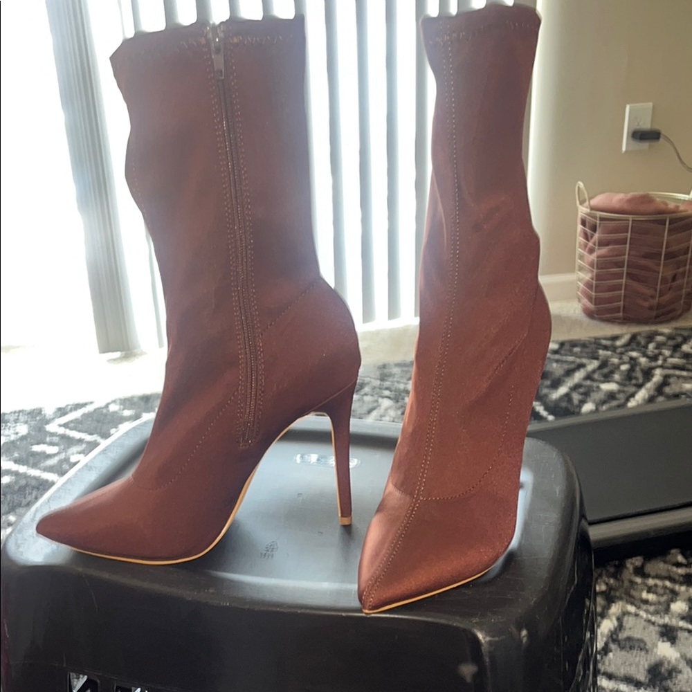 Brown Heeled Boots with Sleek Design